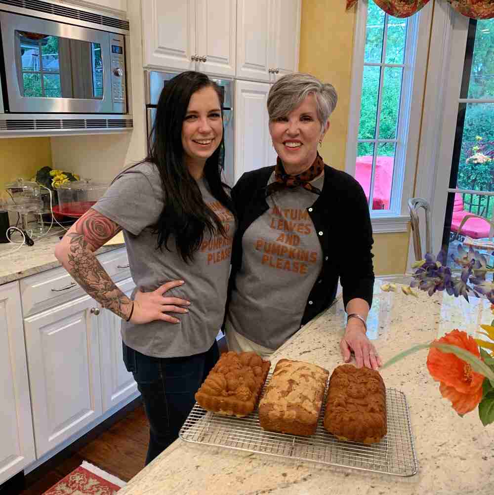 Here I am with my youngest daughter wearing fall tee shirts and showing off the bread.