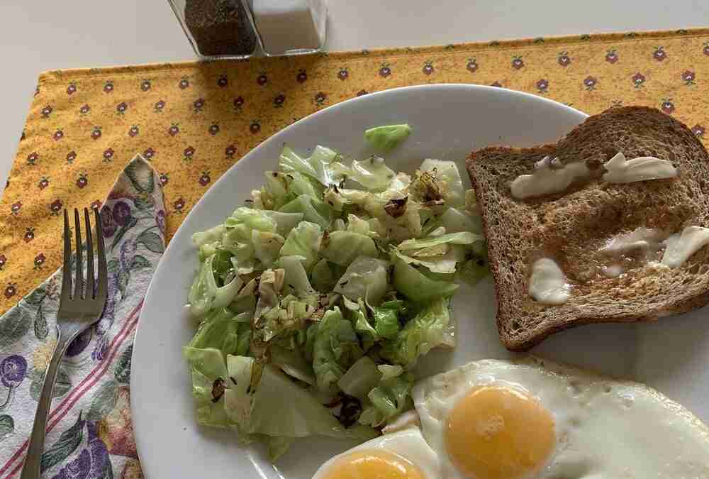 Delicious Sauteed Cabbage with Sunnyside Up Eggs!