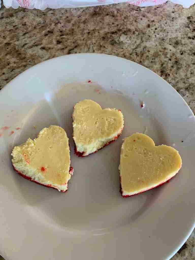 Success!  Heart-shaped cheesecakes on a platter.