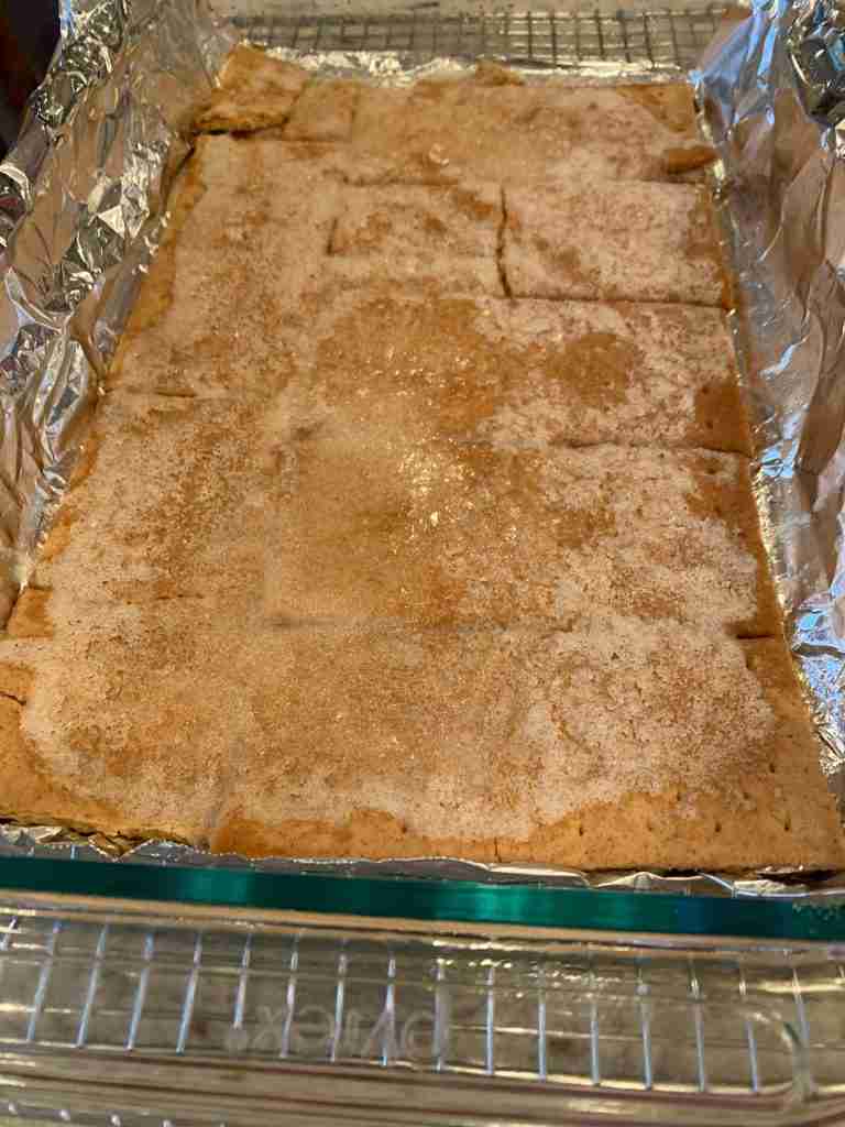 This is the crackers after they have been baked in the oven and the sugar mixture is still a bit bubbly from the oven heat.