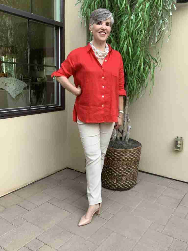 A cute casual outfit for Valentine's Day with a red linen shirt over tan trousers.  I added a chunky pearl choker and tan D'orsay pumps.