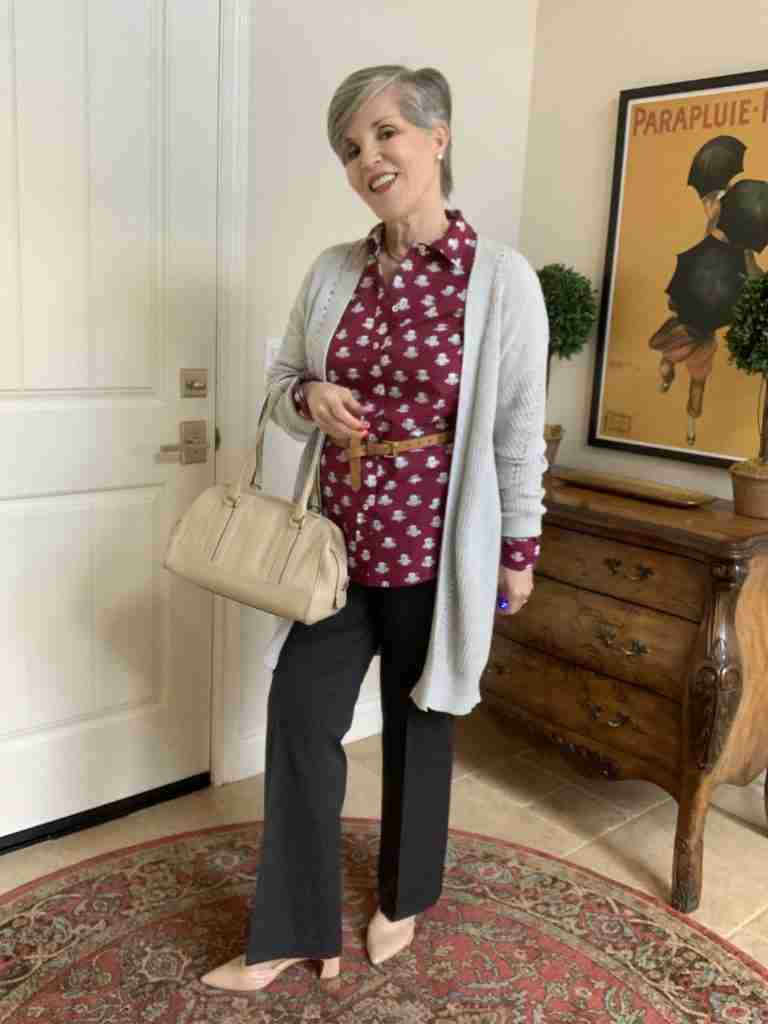Outfit Number Two (of the Happy Valentine's Day Outfits): Workwear look for Valentine's Day.  A burgundy tea-cup print shirt belted under a gray cardigan, gray trousers, and nude pumps with a tan bag.
