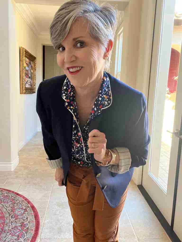 Brown paper bag waist pants with a navy blue boyfriend blazer and leopard D'orsay pumps.  My navy print shirt is a pajama top
that I bought last spring because of the sweet little hearts on it!