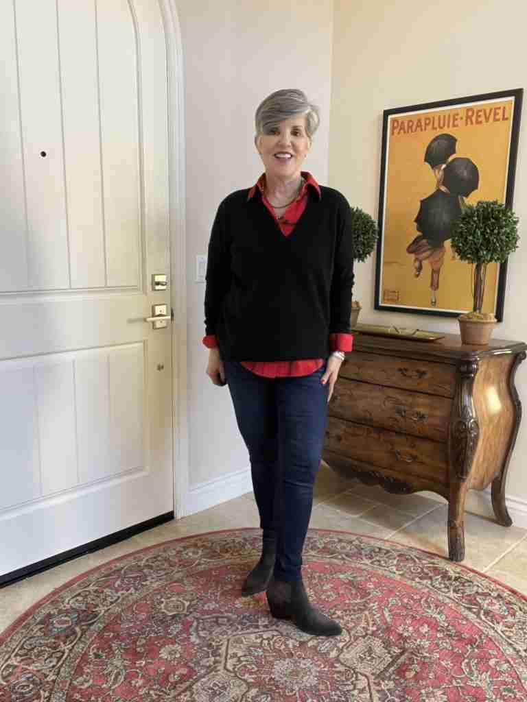 Here in this winter outfit idea, I paired a black cashmere v-neck sweater with an orange-red and black plaid shirt.  Again, I wore the gray booties with the skinny jeans.  To fill in the neckline, I added a multi-stranded necklace.