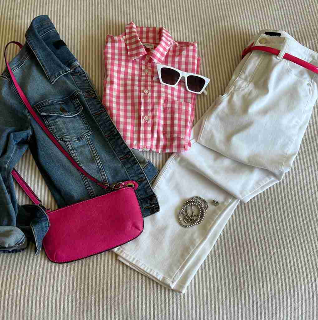 In the fifth and final look, I paired a medium wash jean jacket with the pink gingham shirt, the white pants, and the sam e white sneakers from above.  I added a small hot pink cross-body bag (that comes in 23 different colors).  Again, I wore the same sunnies, bracelet, and earrings.  I added a hot pink patent leather belt for fun!