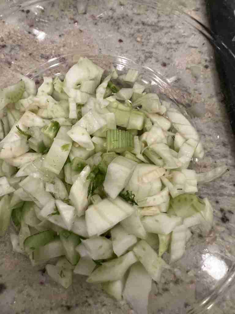 Here is chopped-up fennel in a glass bowl.