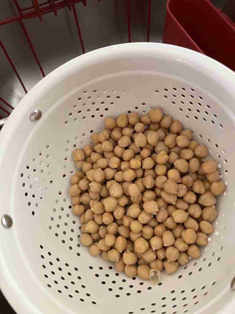 Here are the raw chickpeas draining in a strainer.