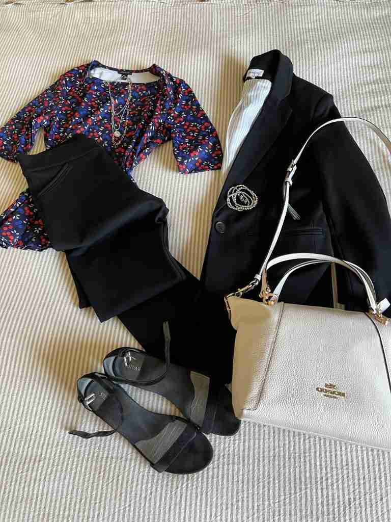 Here, I wore a dark floral tee with a black blazer and black Spanx pants.  I added the white bag from earlier looks and the silver bracelet and necklace.