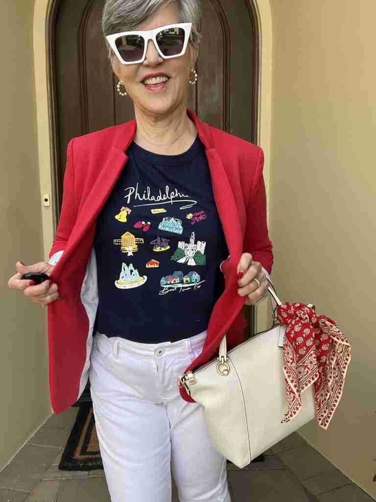 In this third cute spring outfit, I wore a cute red knit jacket with a navy graphic tee and white jeans.  My white bag has a red bandana tied to the handle.