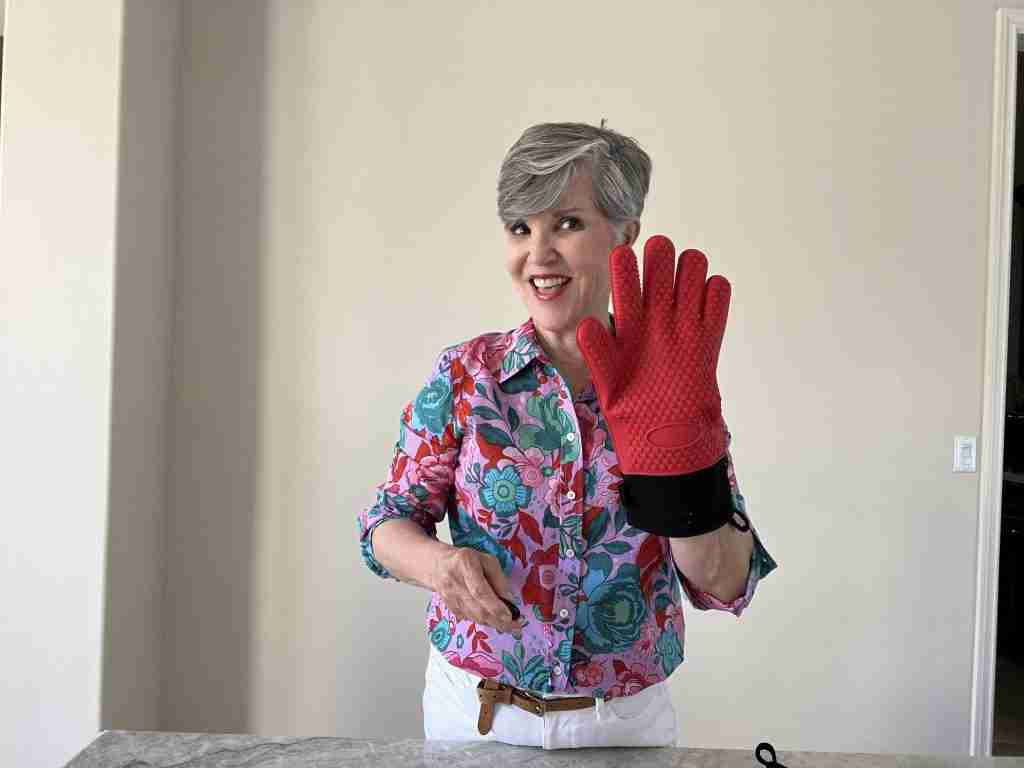 I am modeling red silicone oven mitts.