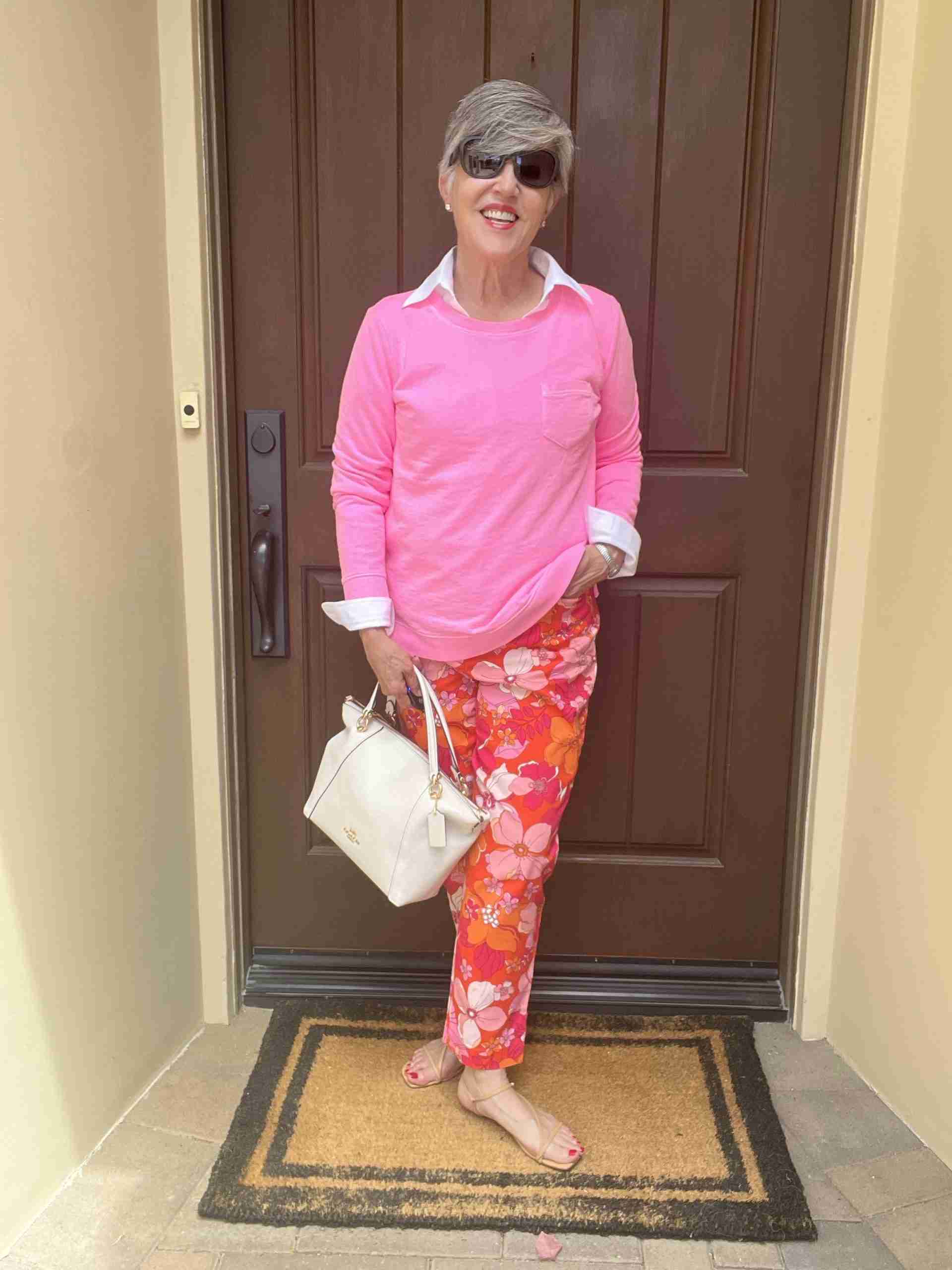 In this fun look, I am wearing the colorful crop pants with a bright pink sweatshirt over a white shirt.  My bag is the same white tote as above and I am wearing nude sandals.