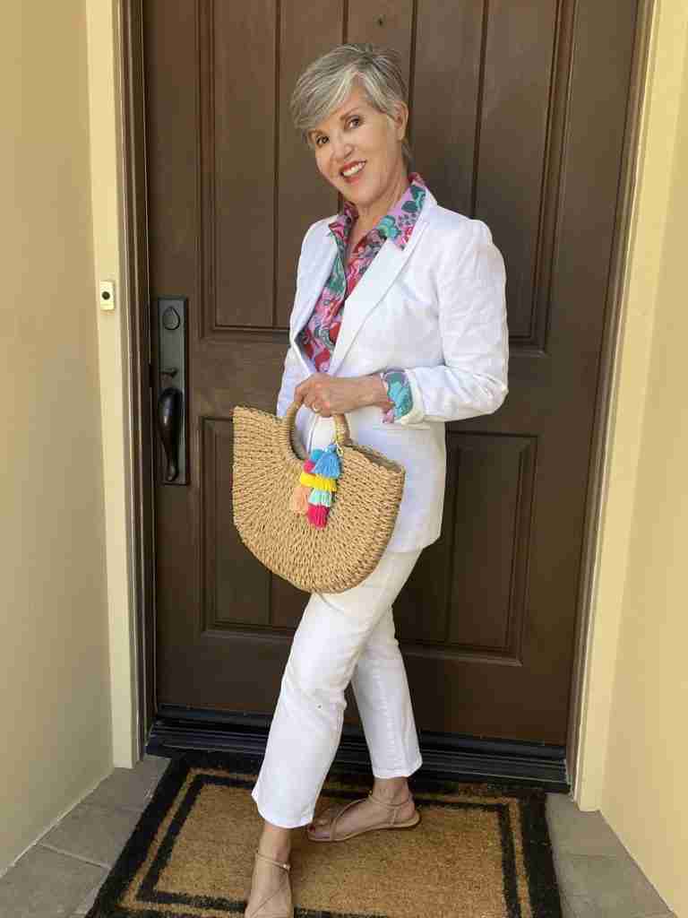 In this fourth outfit, I added a bit more color to the white "suit" by adding this bag that has a collection of colorful pompoms.  This is a fun way to add the littlest bit of pop to your look, don't you think?
