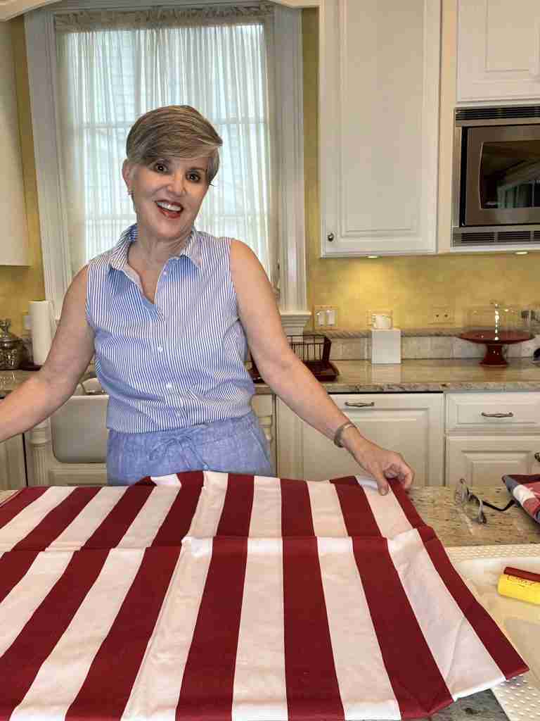 This entertaining essential is a red and white striped tablecloth.