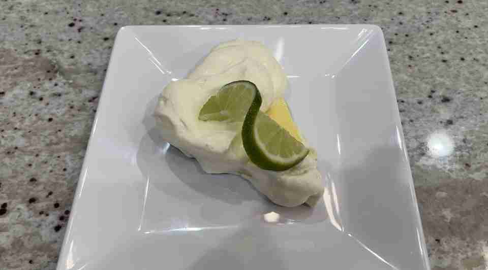 Lastly, here's a piece of the best key lime pie recipe! garnished with whipped cream and a lime slice. Yum!