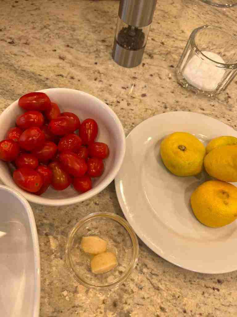 Here are some of the the ingredients including delicious cherry tomatoes, lemons, and garlic.