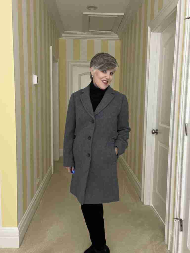 Here is the second of the two Talbots coats.  It is a grey boucle single breasted reefer coat with pockets along the side seam.  There is am inset waistband in the back as well as a single vent.