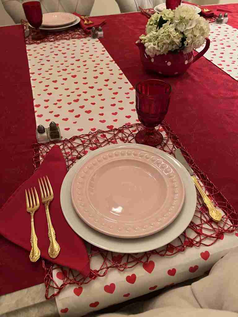 I've added red goblets and one of the two teapots as well as gold flatware.
