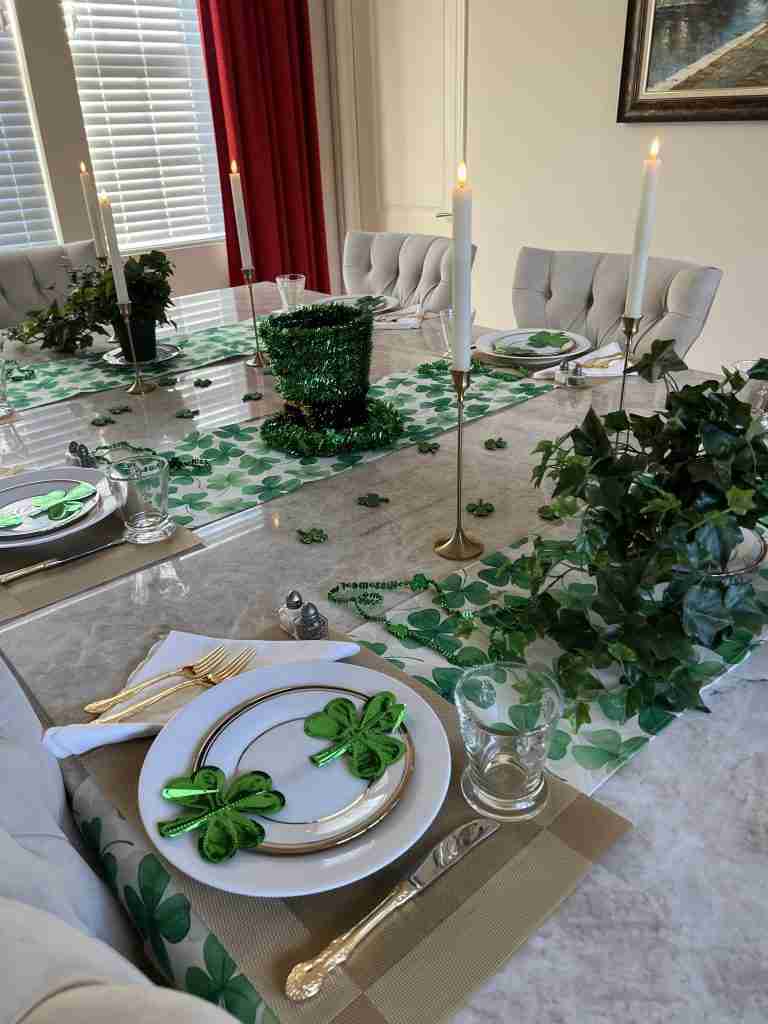 Here is my St. Patrick's Day table decorations including shamrock table runners, a St. Patrick's Day centerpiece, and St. Patrick's day door decorations.
