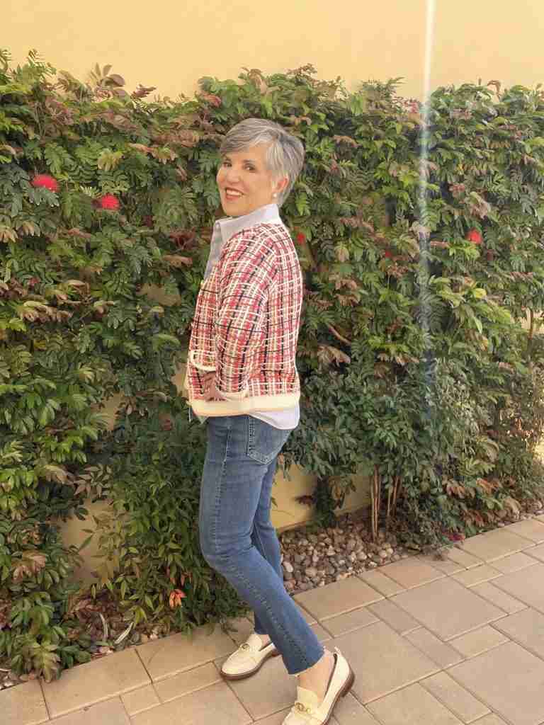 Here is a more casual way to style a syle a tweed jacket.  I am wearing a blue pin-striped shirt, untucked and with the cuffs rolled up a bit under the plaid jacket with the same jeans as the first outfit.  I switched the pumps out for nude loafers.