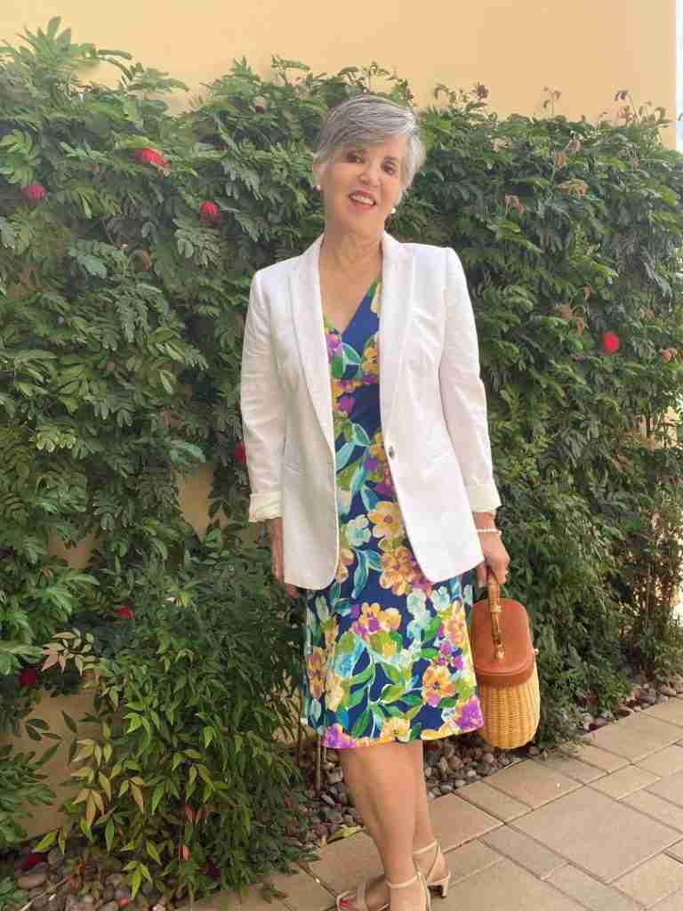 Here I am wearing a floral (sold out) dress with a J Crew factory blazer (see link in the post.  But I put up this picture to show you last year's J Mc Laughlin wicker and leather summer purse.  Check out the images below from the J Mc Laughlin sale for lot s of similar cute bags!