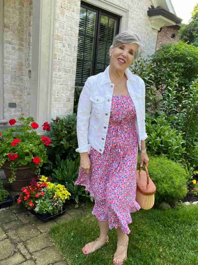 Here is a full shot of my red, white, and blue sundress with the jean jacket and summery bag, The dress has a small ruffle at the hem.