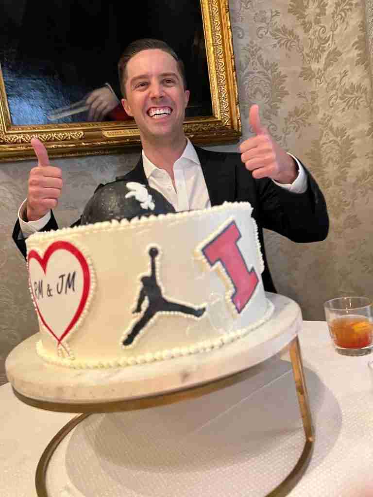 Here the groom is standing in front of the Groom's cake showing his classic "thumbs up" as he laughs at the Sox logs on the baseball cap which is atop the cake.