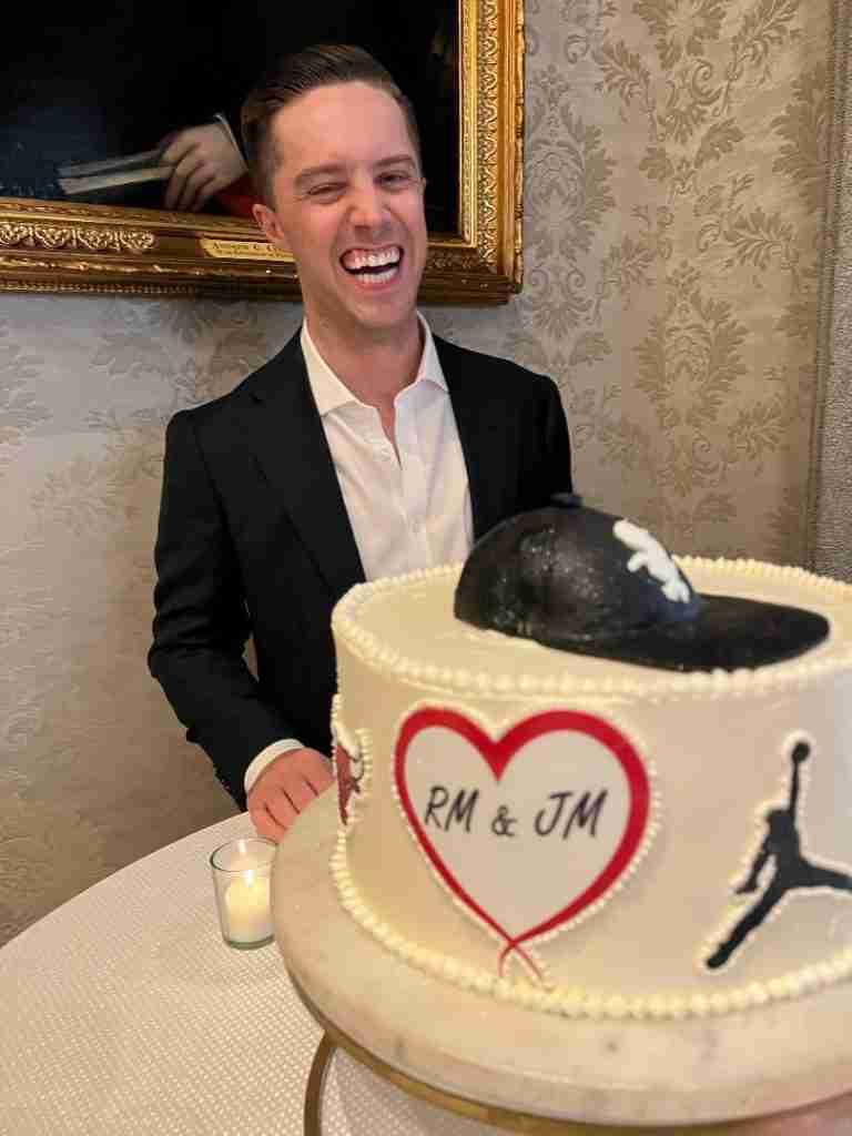 Here my son is laughing at the heart on the Groom's cake.  The chef wrote the wrong initials for my son!