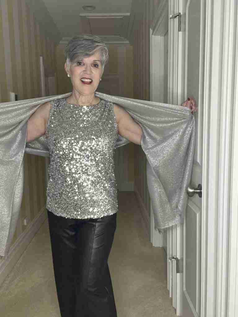 Here is the silver sparkly tank with a shimmery silver pashmina worn over black faux leather pants.